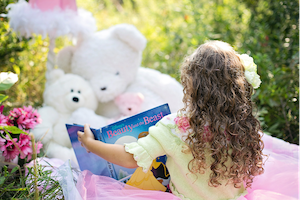 Child Reading a Book